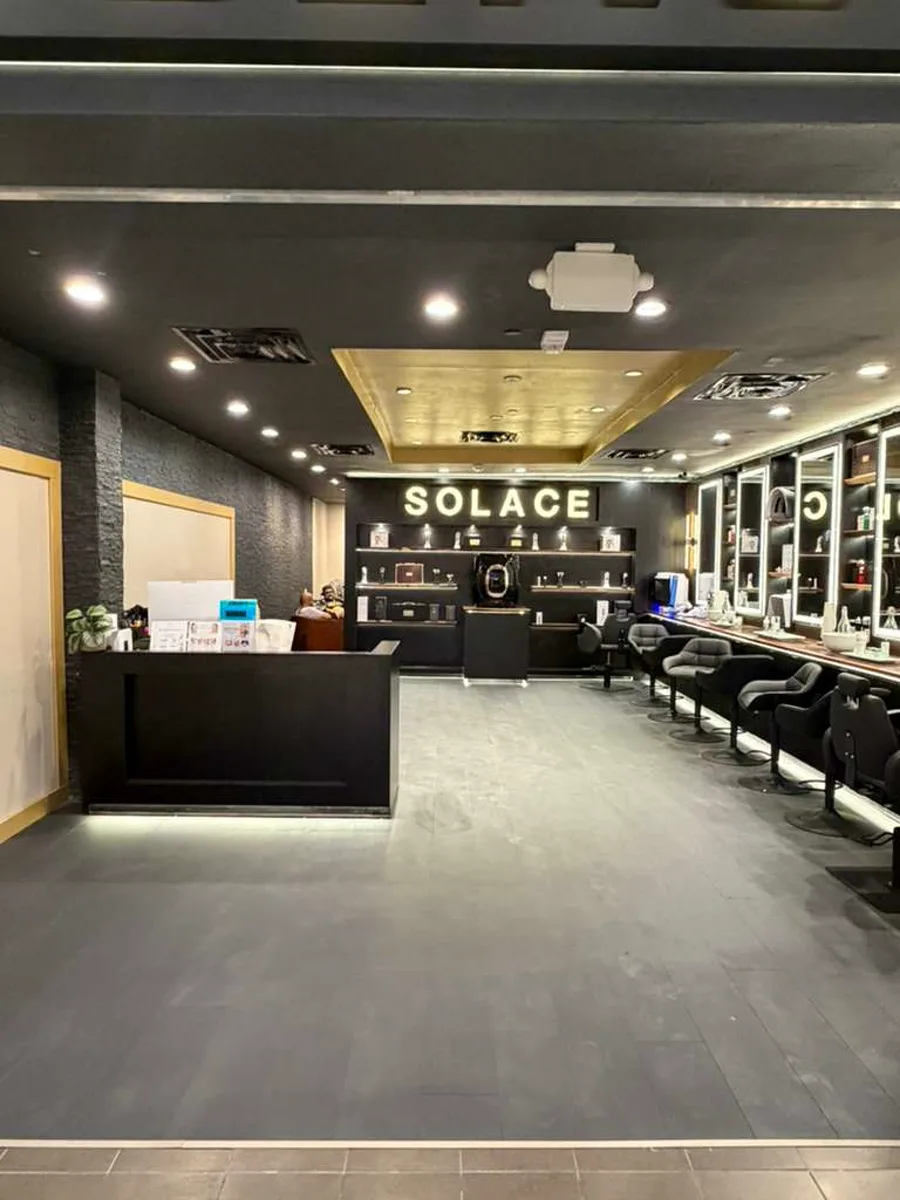 Reception and product wall inside the Solace studio